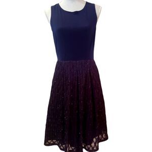 Karen Steven's sleeveless lace over